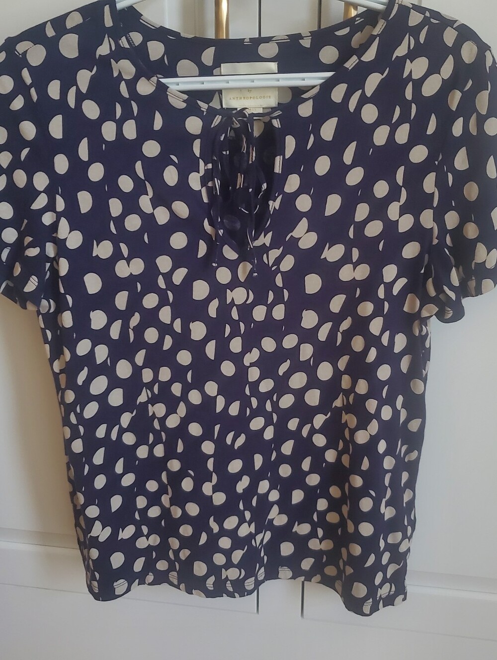 Anthropologie Navy Blue and Cream Polka Dot Tie-Neck Blouse